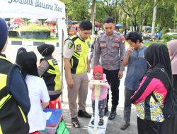 Rumkit Bhayangkara Ikuti Ramaikan Karnaval Budaya Isen Mulang 2025 Dengan Pelayanan Kesehatan Gratis