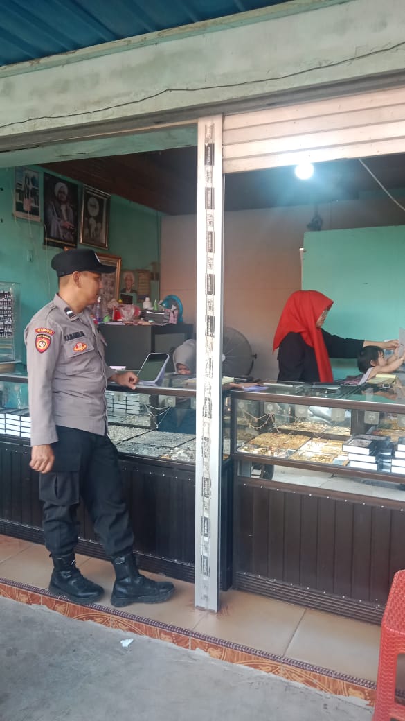 Personil Piket Polsek Bulik Laksanakan Patroli Pertokoan