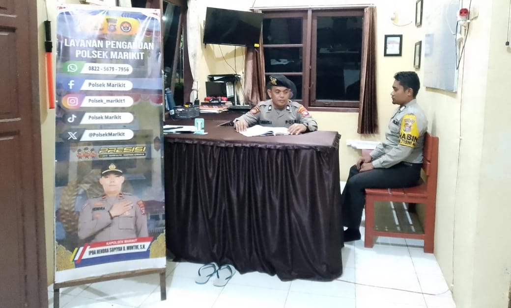Personil Polsek Marikit Stand By di Mako Penjagaan.
