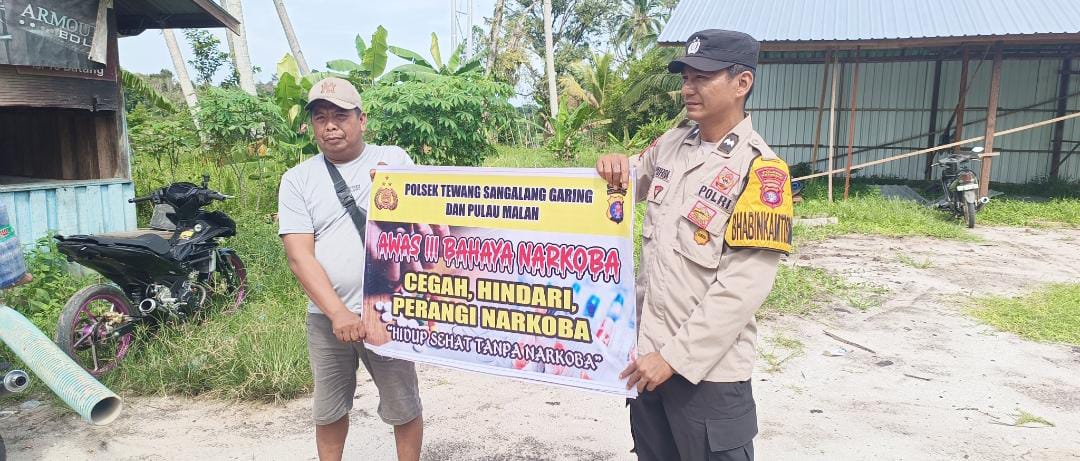 ‎Melalui Media Spanduk, Polsek Tewang Sangalang Garing dan Pulau Malan Imbau Warga Tidak Terjerumus  Penyalahgunaan Narkoba.
